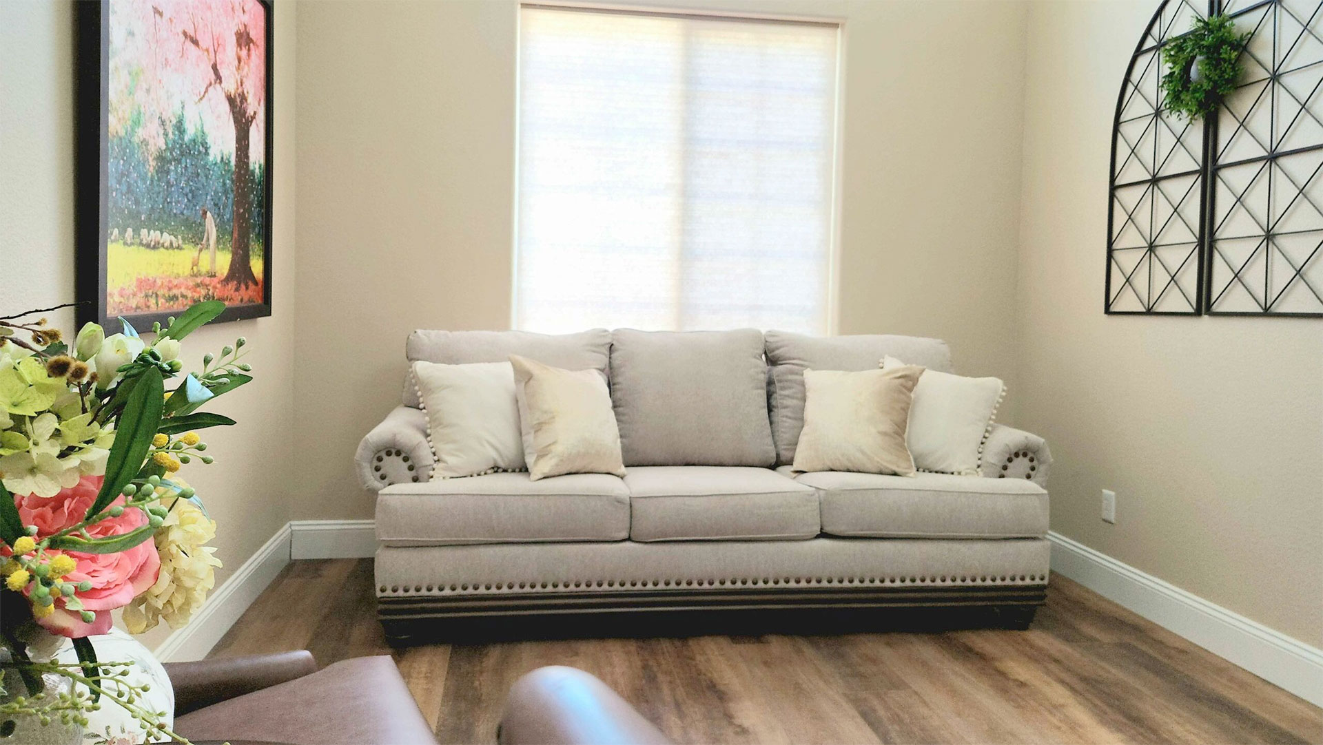 A couch by a window